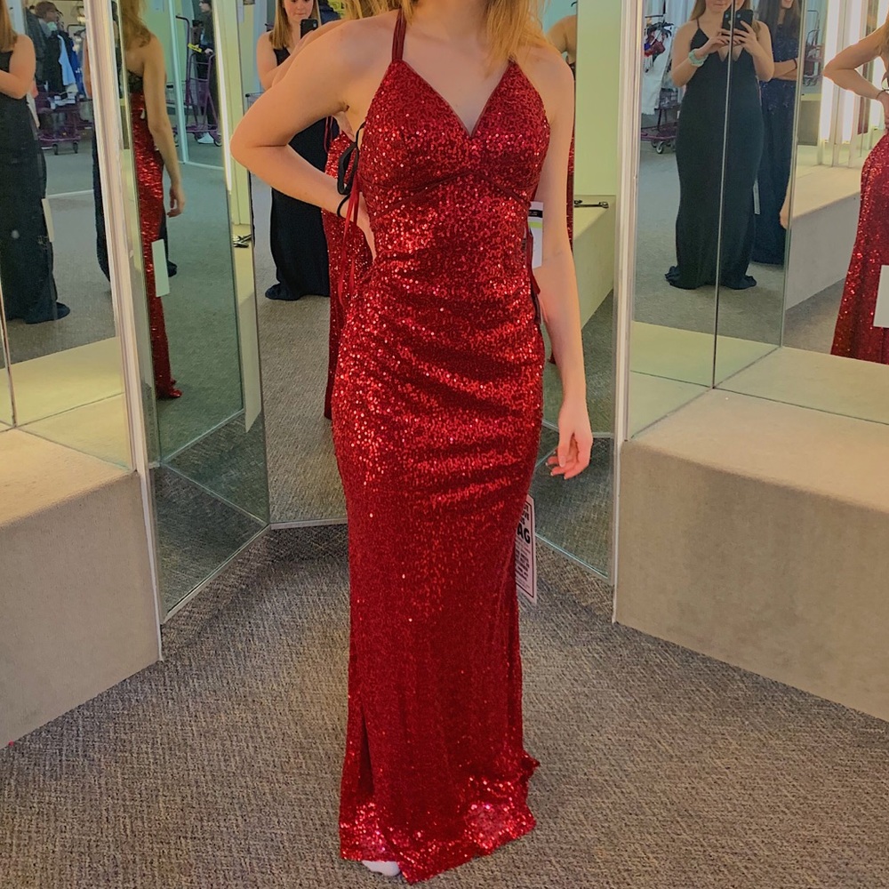 Red sequined prom dress